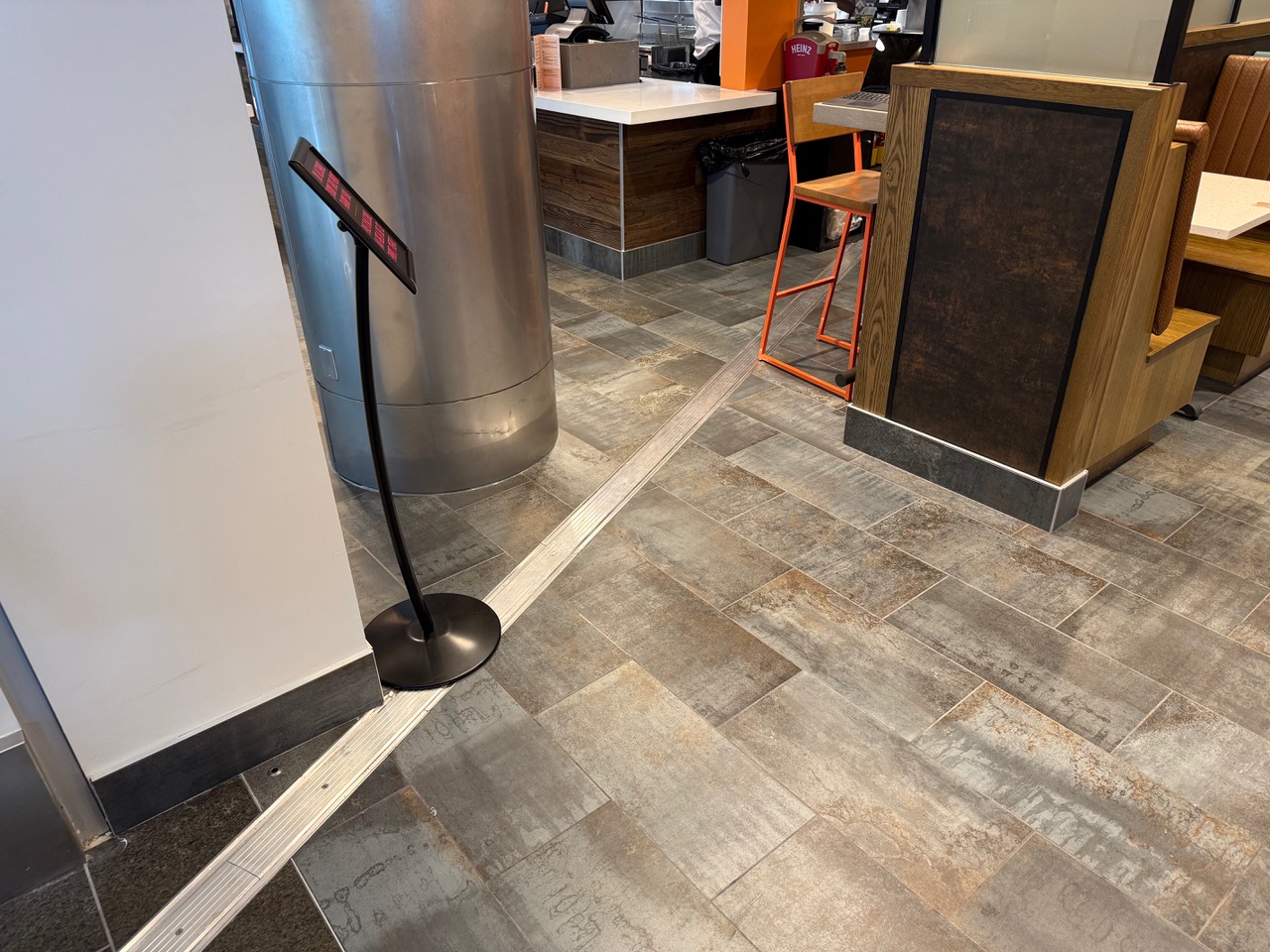 Commercial floor tile and threshold installation
