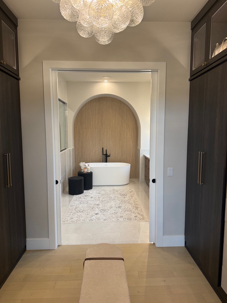 Luxury vinyl flooring in an upscale closet area