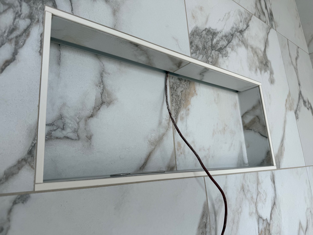 Tiled shower niche detail